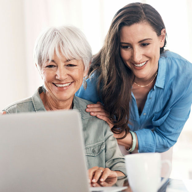 Two women with laptop